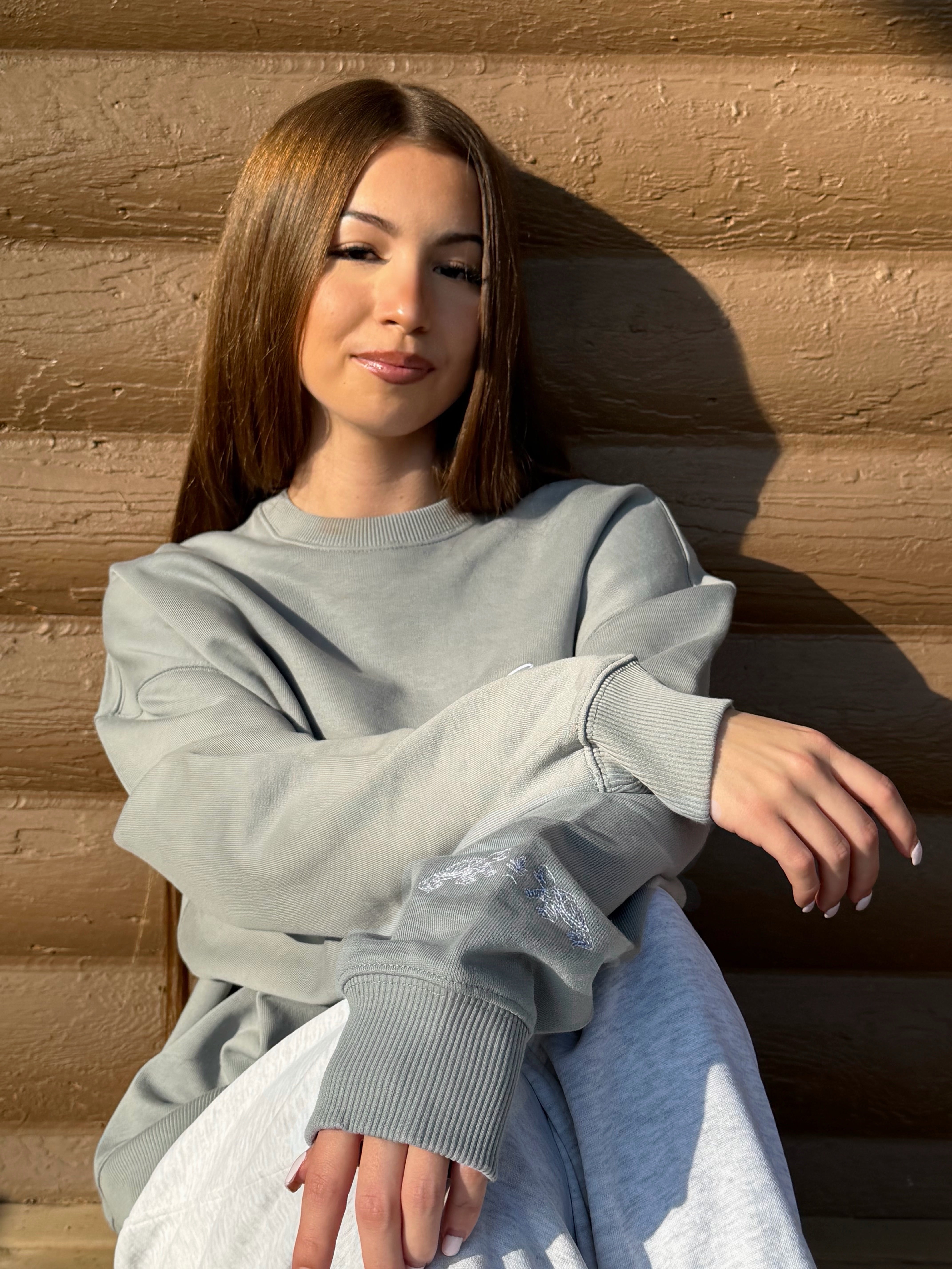 Young female wearing Misty Grey Oversized Crew Neck